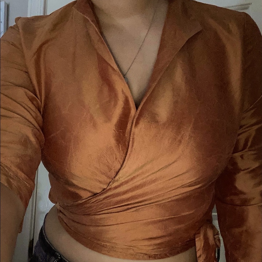 Connie roberson top. Copper color. Size M